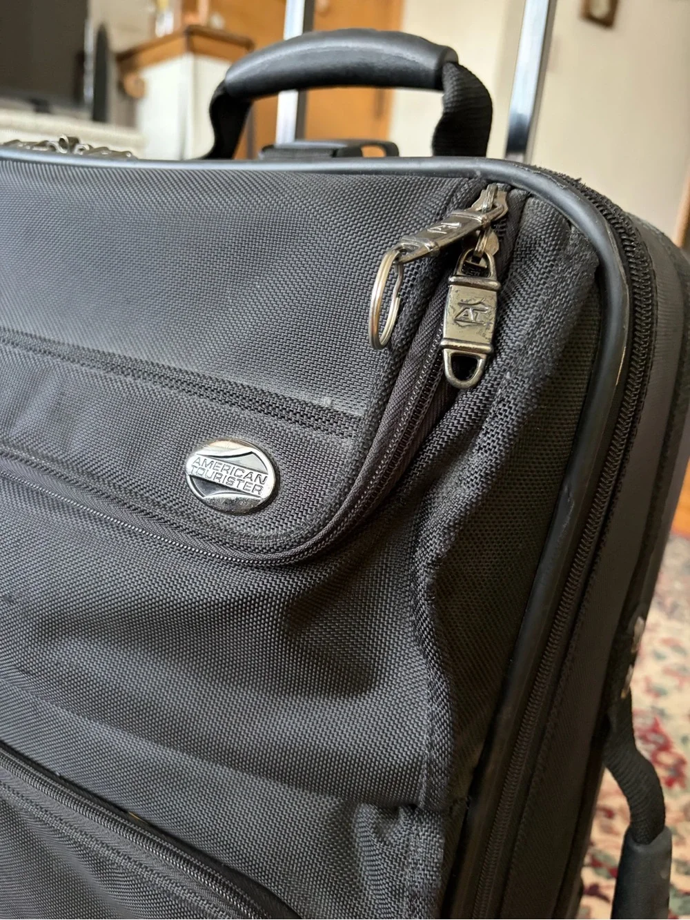 American Tourister Black Softside Spinner with Front Organizer Pockets